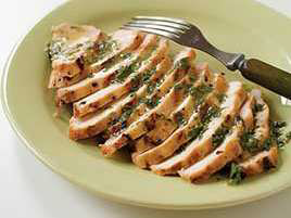 Grilled Orange-Tarragon Chicken Breasts on a Charcoal Grill