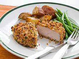Crunchy Baked Pork Chops with Prosciutto and Asiago Cheese
