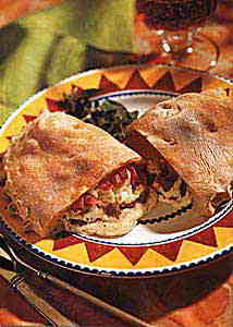 Calzones with Cheese, Sausage and Roasted Red PepperBon Appétit |  March 1999