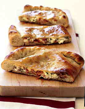 Double-Cheese and Prosciutto CalzoneBon Appétit |  February