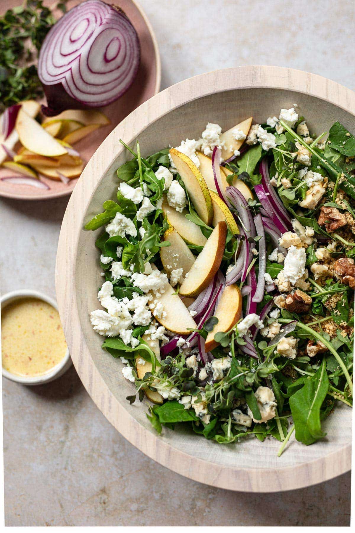 Arugula Salad with Pears, Almonds, Goat Cheese, and Dried Apricots