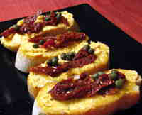 Goat Cheese with Paprika, Garlic, Sun-Dried Tomatoes and Capers